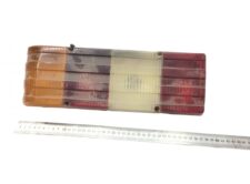 Lampa spate stânga Volvo 77700439, multi-segmentată, cu culori roșu, alb și galben