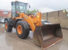 Buldoexcavator Case 721F - motor recondiționat, distribuitor hidraulic, cutie de viteze