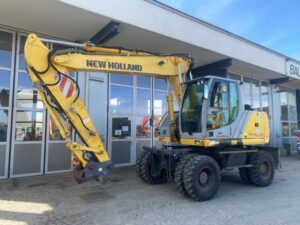 Dezmembrăm excavator new holland mh plus - piese și componente disponibile 1 Dezmembrăm excavator new holland mh plus – piese și componente disponibile