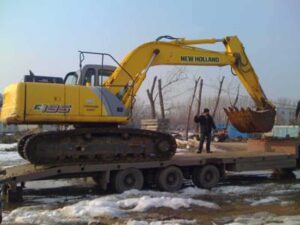 Dezmembrare excavator new holland e195