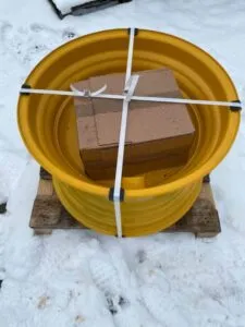 Jantă pentru încărcător frontal caterpillar 980g – nouă, galbenă, pe palet de lemn